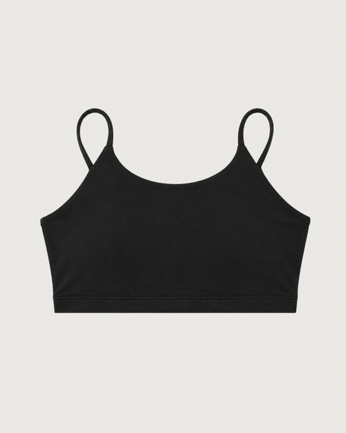 Front view of SQWOD black Balance CrossFit sports bra.